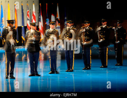 The US Army Drill Team with 3rd U.S. Infantry Regiment The Old Guard perform during a Twilight Tattoo ceremony in celebration of the US Army's 235th birthday at Ft. Myer, Va., June 16, 2010.  The Old Guard's motto is Noli Me Tangere from Latin: - Touch me Not.  Army photo by D. Myles Cullen released Stock Photo