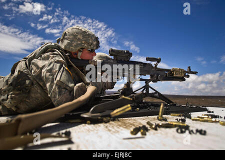 U.S. Army Spc. Geoffery Lovan, Alpha Company, 1st Battalion, 21st Infantry Regiment, 2nd Stryker Brigade Combat Team, 25 Infantry Division, Schofield Barracks, Hawaii fires a M240L Medium Machine Gun Sept. 19, 2012, at Pohakuloa Training Area PTA, on Hawaii's Big Island. Soldiers from 1st Battalion, 21st Infantry Regiment, are conducting a month-long exercise at PTA which is focused on platoon level collective training with enabler integration. The training will culminate in a combined arms live fire exercise later this month.  Department of Defense photo by U.S. Air Force Tech. Sgt. Michael R Stock Photo