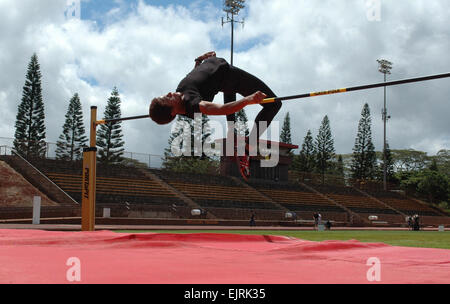 MILILANI, Hawaii - Adriane Stone, an Army spouse, leaps over the high jump crossbar during a practice session at Mililani High School. After a seven-year hiatus, Stone is back in form, recently qualifying for the U.S. Olympic track and field trials.  Molly Hayden, U.S. Army Garrison-Hawaii Public Affairs  see: /-news/2008/06/24/10294-army-spouse-qualifies...  /-news/2008/06/24/10294-army-spouse-qualifies-for-us-olympic-track--field/ Stock Photo