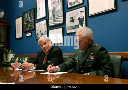 Sen. Christopher S. &quot;Kit&quot; Bond R-Mo., left, and Lt. Gen. Clyde Vaughn, director,Army National Guard, answers questions from the media during a press conference held in Bond's office, Monday, Dec. 22, 2008. Bond recently returned from Afghanistan where he saw first hand work that the Agriculture Development Teams have been doing to help build a sustainable farming base in the war torn region. First stood up in 2007,the ADTs are made up of Guard Soldiers with strong farming backgrounds and have been instrumental in rebuilding Afghanistan. Staff Sgt. Jon SoucyReleased          Missouri  Stock Photo