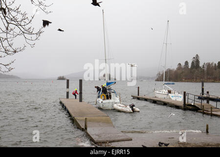 Lake Windermere, Lake District, UK. 31st March, 2015. UK Weather: 45mph gusts of wind halt all boats on Lake Windermere Bowness Bay Changeable weather Sun to rain in minutes   Credit: Gordon Shoosmith/Alamy Live News Stock Photo
