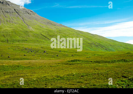 A green mountain scenery on the Isle of Skye in Scotland Stock Photo