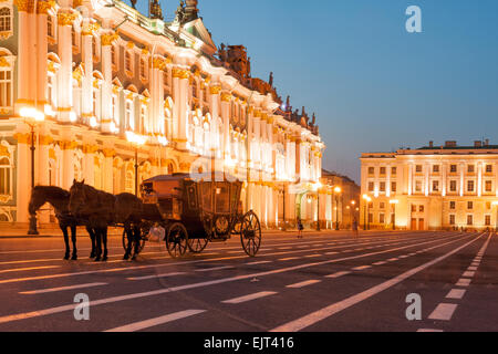 Horse-drawn carriage by the Winter palace on Palace square, Saint Petersburg, Russia Stock Photo