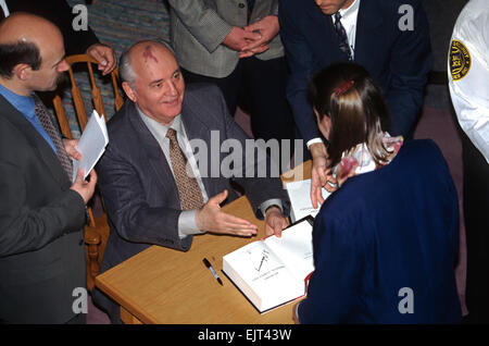 Former Soviet President Mikhail Gorbachev, with his distinctive port-wine stain on his head, smiles as he signs copies of his new autobiography 'Memoirs' at Borders Books & Music, October 25, 1996 in Washington, D.C. Stock Photo