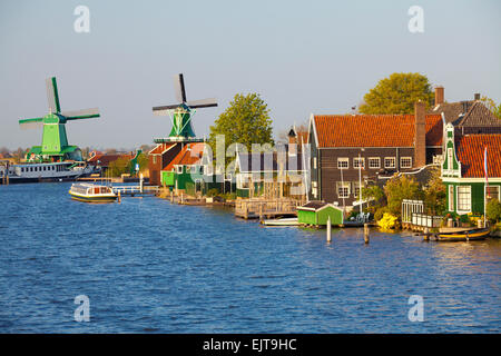 Traditional Windmills at the Zaanse Schans open-air museum, Amsterdam, Netherlands Stock Photo