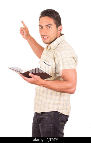 young handsome male teacher holding notebook Stock Photo