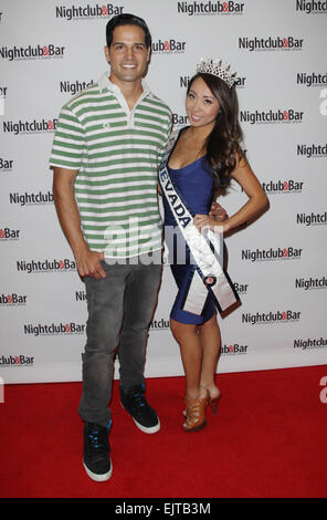 Las Vegas, Nevada, USA. 31st Mar, 2015. BMX Pro Ricardo Laguna and Miss Nevada United States 2014 Lisa Song-Sutton attend the grand opening of the 2015 Nightclub & Bar Convention & Trade Show on March 31, 2015 at the Las Vegas Convention Center in Las Vegas, Nevada. Credit:  Marcel Thomas/ZUMA Wire/Alamy Live News Stock Photo