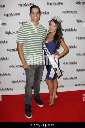 Las Vegas, Nevada, USA. 31st Mar, 2015. BMX Pro Ricardo Laguna and Miss Nevada United States 2014 Lisa Song-Sutton attend the grand opening of the 2015 Nightclub & Bar Convention & Trade Show on March 31, 2015 at the Las Vegas Convention Center in Las Vegas, Nevada. Credit:  Marcel Thomas/ZUMA Wire/Alamy Live News Stock Photo