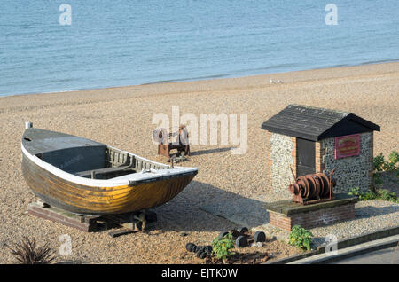 Old fishing boat and hut on a beach. Stock Photo