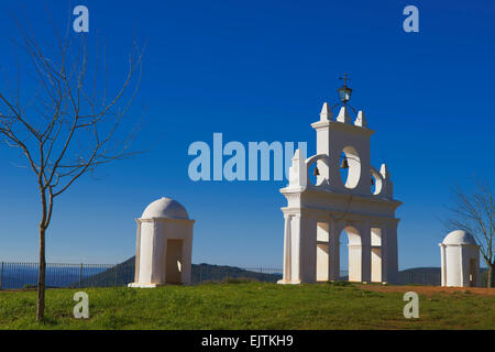 Alajar, Bell tower at the Arias Montano rock, Sierra de Aracena and Picos de Aroche Natural Park, Huelva, Andalucia, Spain. Stock Photo