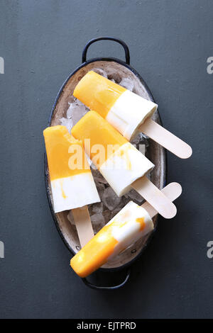 Mango and coconut Ice cream popsicle Stock Photo