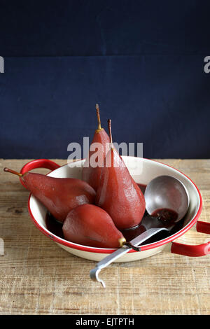 Poached pear in red wine Stock Photo