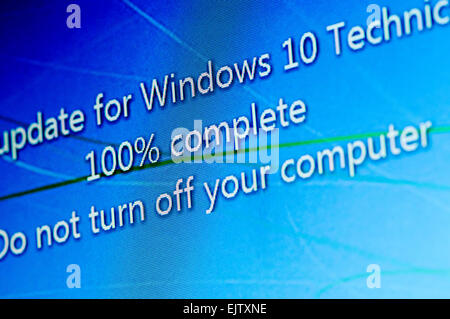 Installing Windows 10 Technical Preview, a public beta release. Stock Photo