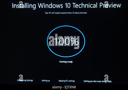 Installing Windows 10 Technical Preview, a public beta release. Stock Photo