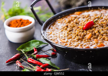 Indian style lentil soup with red hot chili pepper Stock Photo