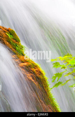 Water falling over rocks Stock Photo - Alamy