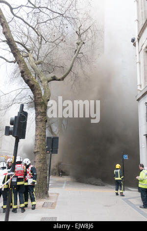 London, UK. 1st April, 2015. Smoke from an electrical fire under the pavement in Holborn, London. Two thousand people were evacuated. Credit:  Trevor Aston/Alamy Live News Stock Photo