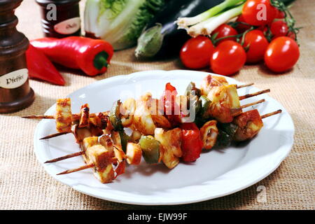 Various types of fish with shrimp on skewers Stock Photo