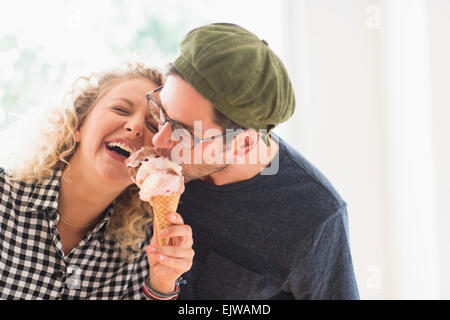 Couple eating ice cream together Stock Photo