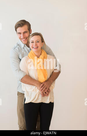 Portrait of smiling young couple Stock Photo