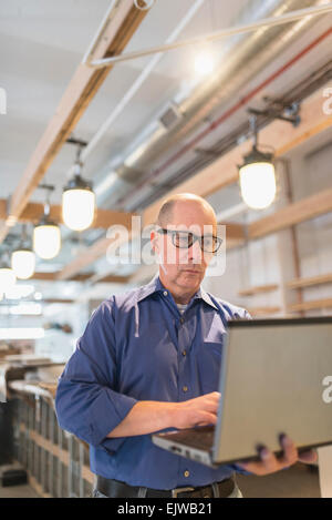 Business owner working with laptop Stock Photo