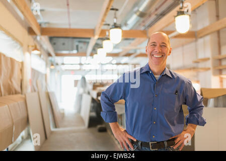 Portrait of smiling business owner Stock Photo