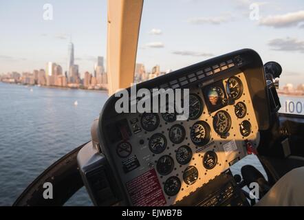 USA, New York State, New York City, Cockpit in helicopter and Manhattan skyline Stock Photo