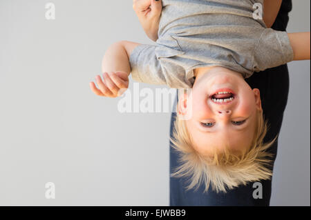 Portrait of boy (2-3) upside down Stock Photo