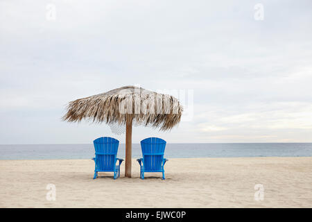 Mexico, Cabo San Lucas, View of deckchairs on beach Stock Photo