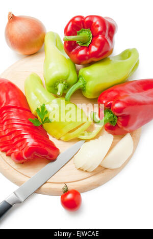 Vegetables and kitchen knife on cutting board Stock Photo