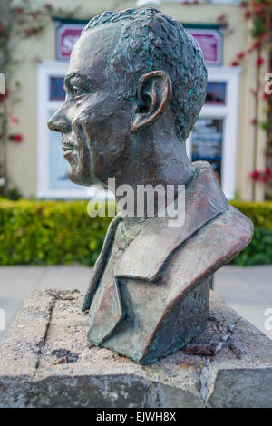A bronze bust of the famous American writer John Steinbeck on Monterey's Cannery Row. His 1945 novel Cannery Row focused on the Stock Photo