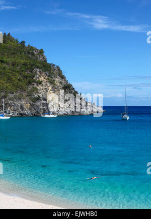 Swimmers enjoy Shell Beach in St. Barts in the Caribbean Stock Photo