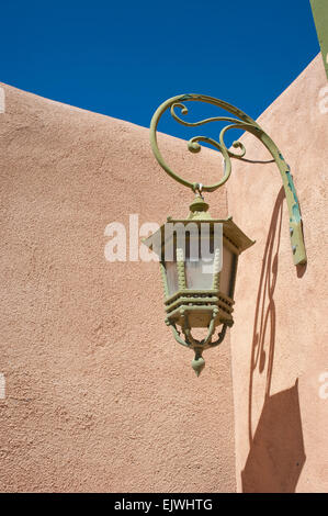 USA New Mexico NM Rancho de Taos lamp lantern on a wall Stock Photo