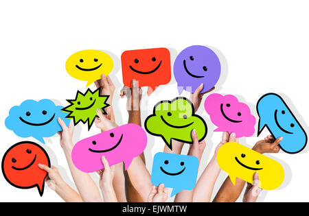 Hands holding smiley faces icons Stock Photo - Alamy