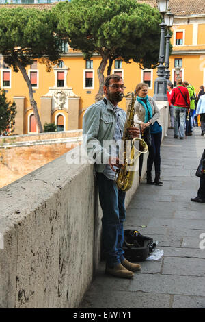 ROME, ITALY - MAY 03, 2014: Street musician playing the saxophone in Rome, Italy Stock Photo
