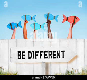 Arms Raised Holding Fishes Stock Photo