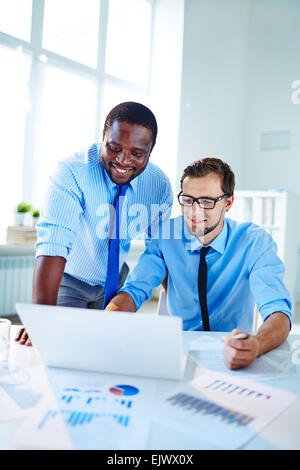 Two confident employees networking at meeting Stock Photo