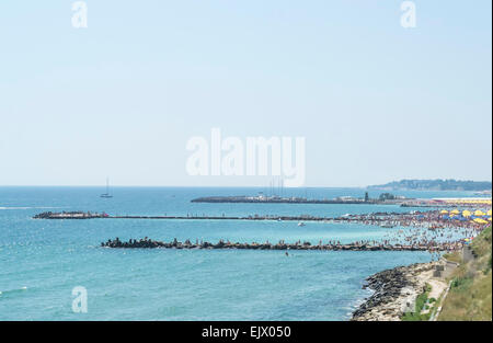 Crowded seashore with tourists in summer vacation on Black Sea Stock Photo
