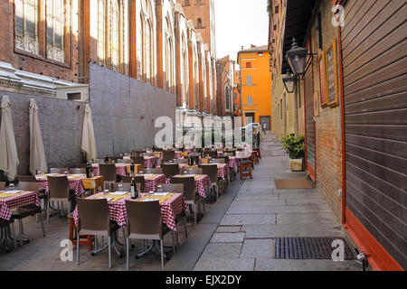 Bologna, Italy - August 18, 2014: Tables of restaurant Zerocinquantuno on Via De'Pignattari in Bologna. Italy Stock Photo
