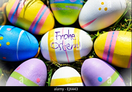 Colorful Easter eggs and German Easter Greeting Stock Photo