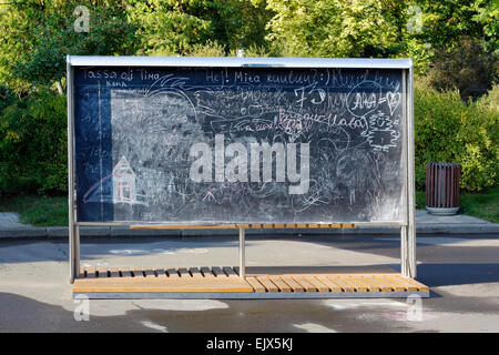 Big public board for drawing by chalk in autumn city park. Summy day Stock Photo