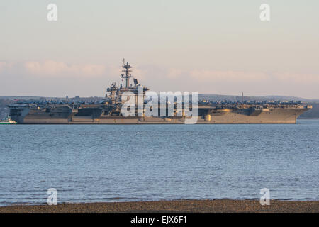 USS Theodore Roosevelt at anchor in The Solent, on a recent visit to the UK. Stock Photo