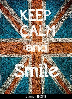 Keep Calm and Smile. United Kingdom (British Union jack) flag background, hand drawing with chalk on blackboard, vintage concept Stock Photo