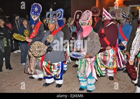 Colorfully dressed pilgrims and dancers are everywhere during the celebration of the Virgin of Guadalupe Feast Day Stock Photo