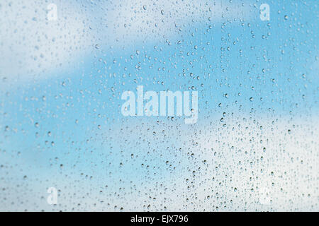 Detail of raindrops on window glass, low depth of focus Stock Photo