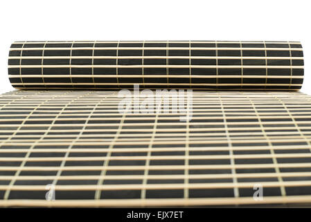 Rolled straw mat Stock Photo