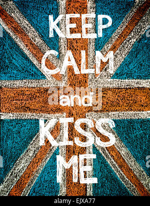 Keep Calm and Kiss Me. United Kingdom (British Union jack) flag, vintage hand drawing with chalk on blackboard, humor concept image Stock Photo