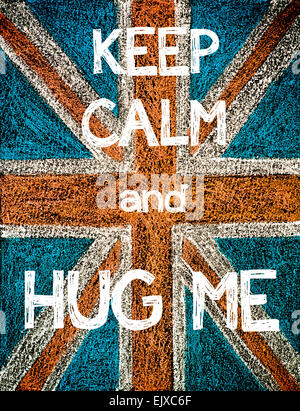 Keep Calm and Hug Me. United Kingdom (British Union jack) flag, vintage hand drawing with chalk on blackboard, humor concept image Stock Photo