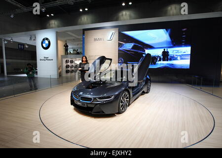 Ilsan, Gyeonggi Province of South Korea. 2nd Apr, 2015. A model poses beside a BMW's i8 during a media preview at the Seoul Motor Show in Ilsan, Gyeonggi Province of South Korea, April 2, 2015. Seoul Motor Show will officially kick off Friday at the Korea International Exhibition Center in Ilsan. © Seongbin Kang/Xinhua/Alamy Live News Stock Photo