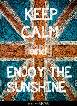 Keep Calm and Enjoy the Sunshine. United Kingdom (British Union jack) flag, vintage hand drawing with chalk on blackboard, humor Stock Photo